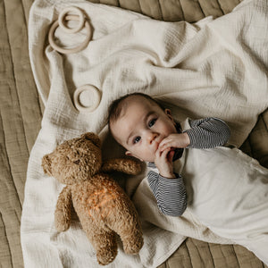 peluche moonie luz y sonido oso capuccino