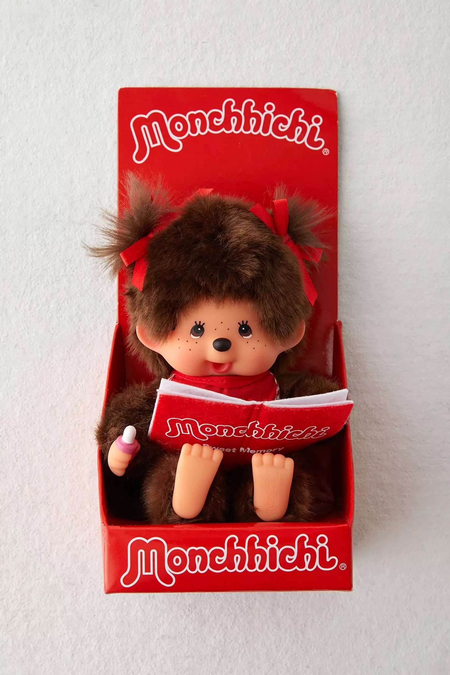 monchhichi leyendo 20 cm