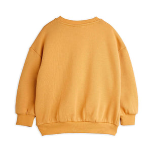 Sudadera Dino Aplique Beige