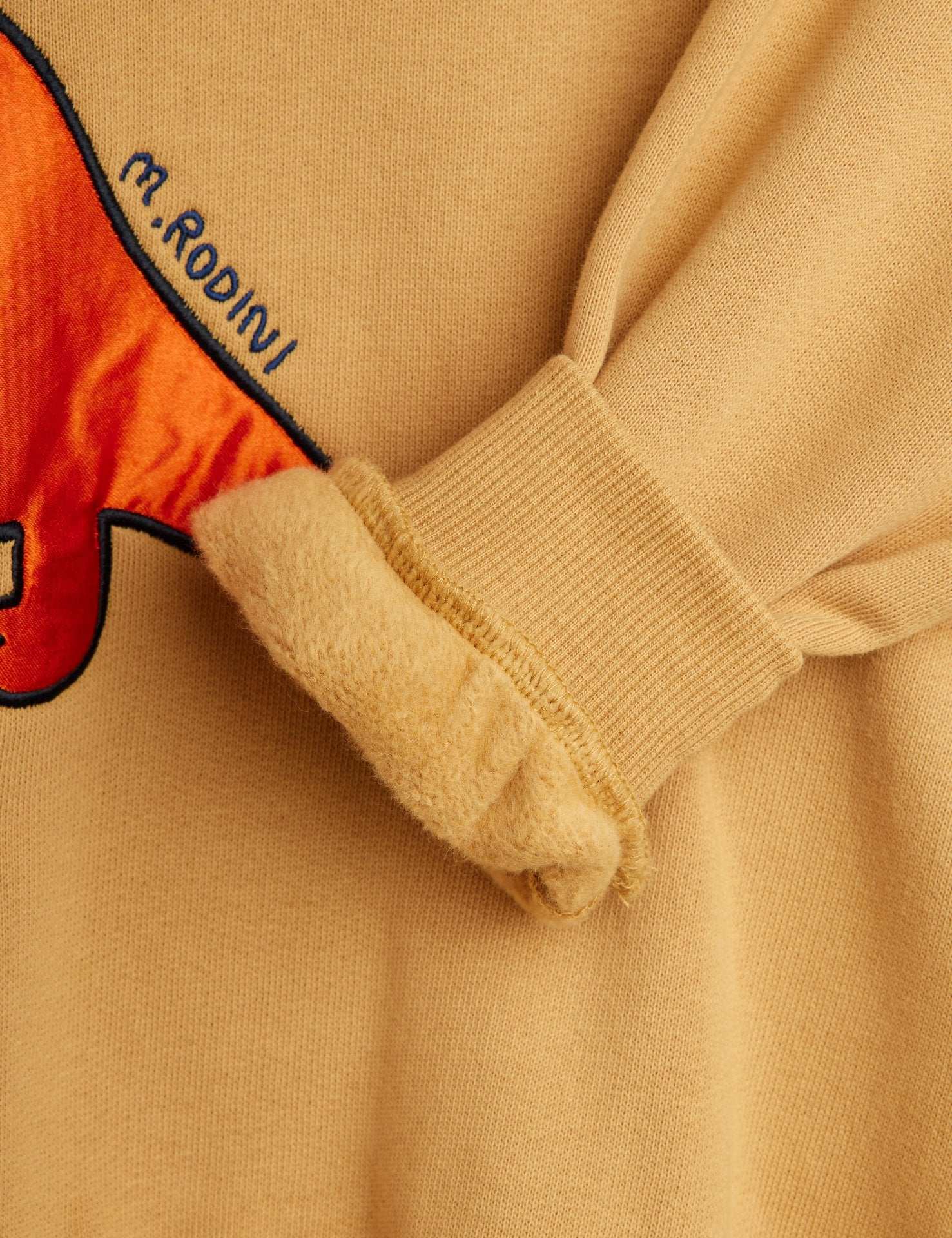 Sudadera Dino Aplique Beige