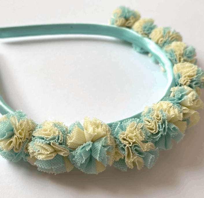 Diadema pompón