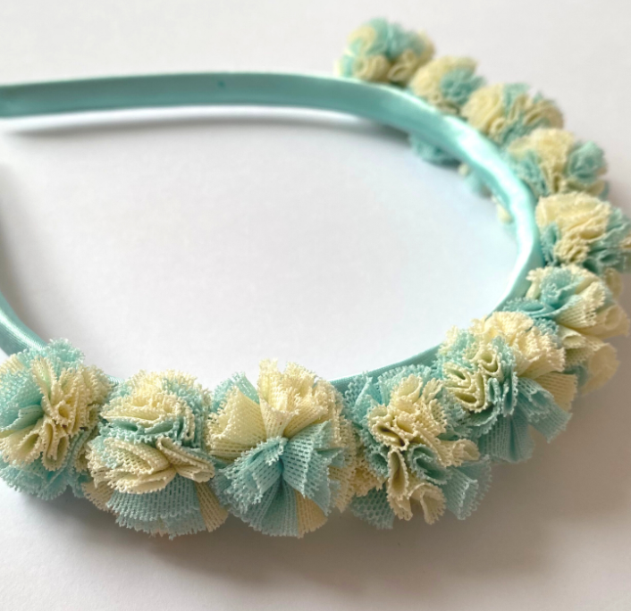 Diadema pompón
