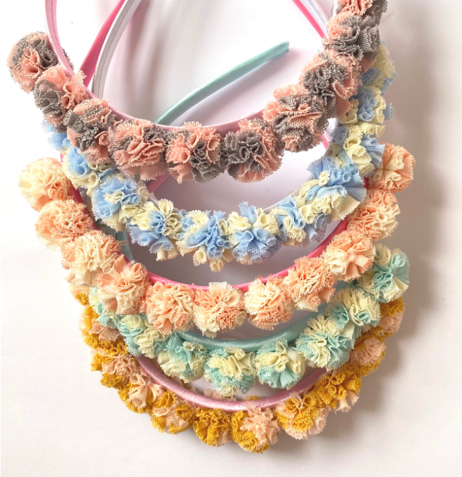 Diadema pompón