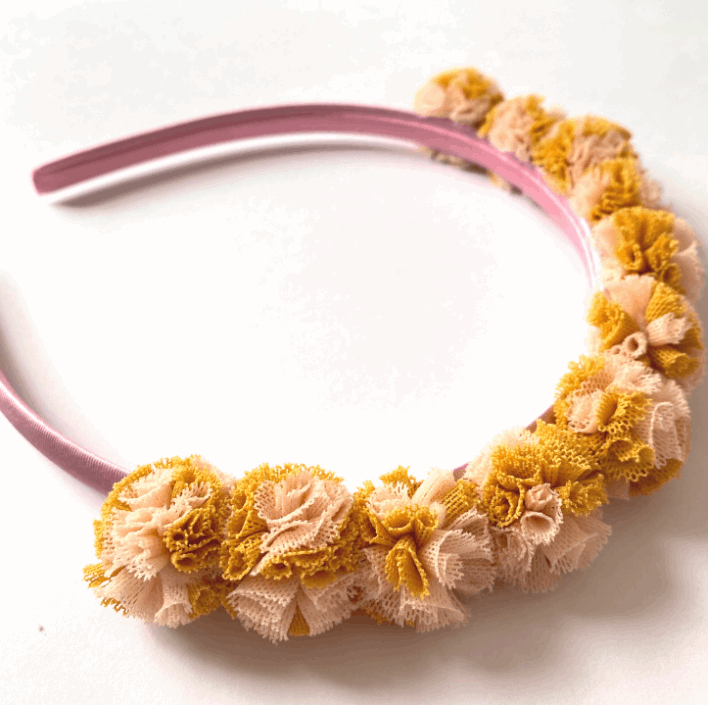 Diadema pompón