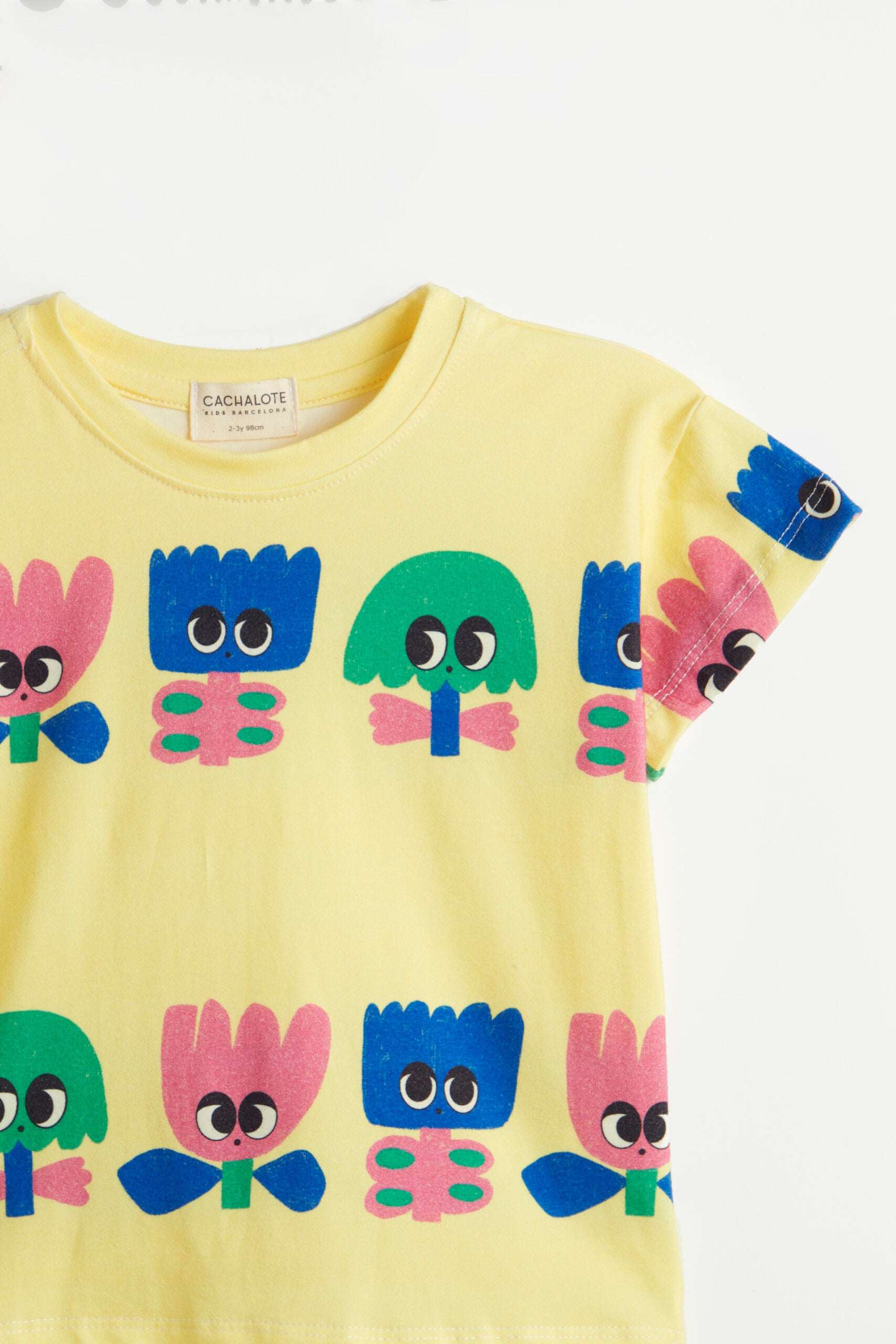 Camiseta amarilla con Flores